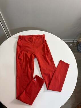 Vuori Women's High-Rise Elevation Performance Leggings in Red